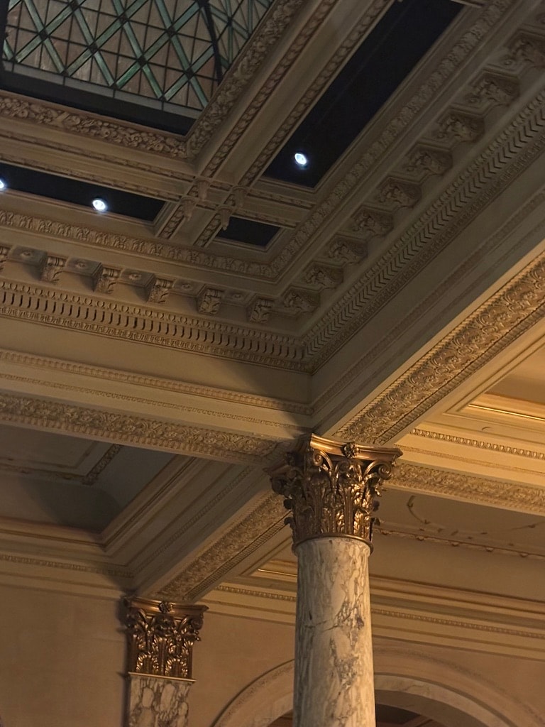 Ornate ceiling and marble columns